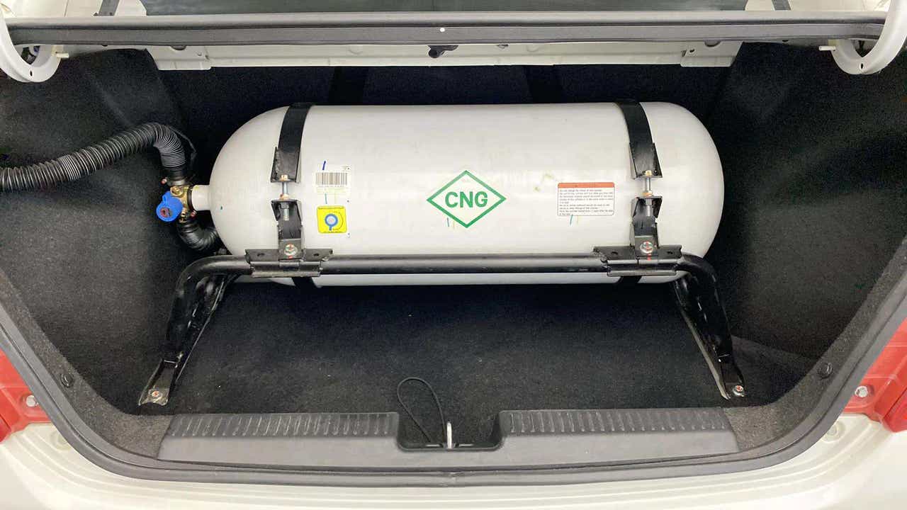 Cng cylinder in the trunk of a Maruti Suzuki Dzire