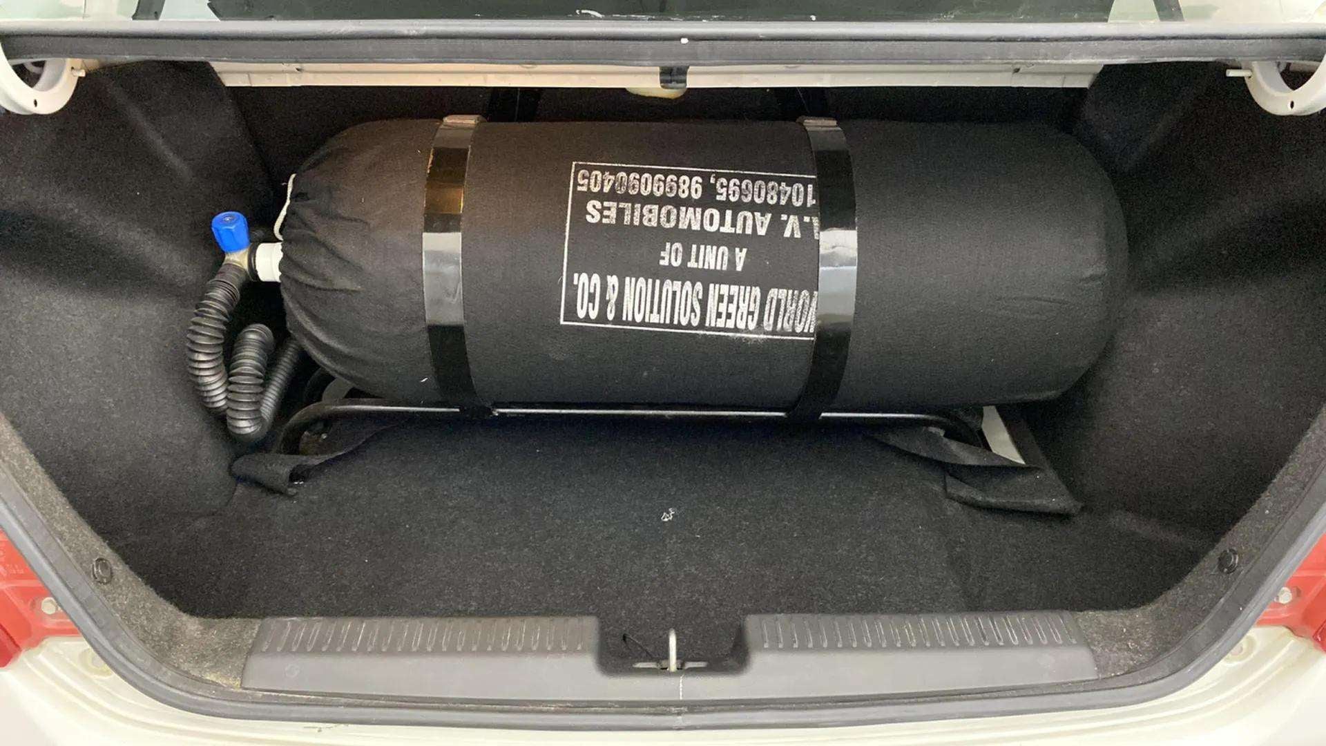 Cng tank inside boot space of a Maruti Suzuki Dzire