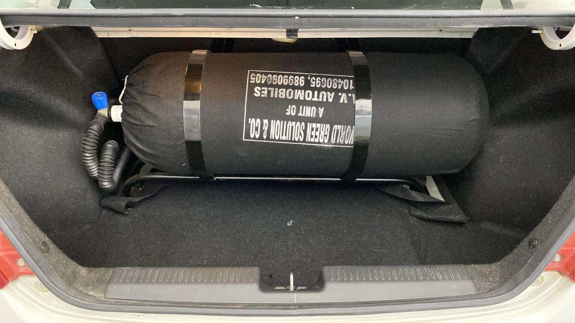 Cng tank inside boot space of a Maruti Suzuki Dzire