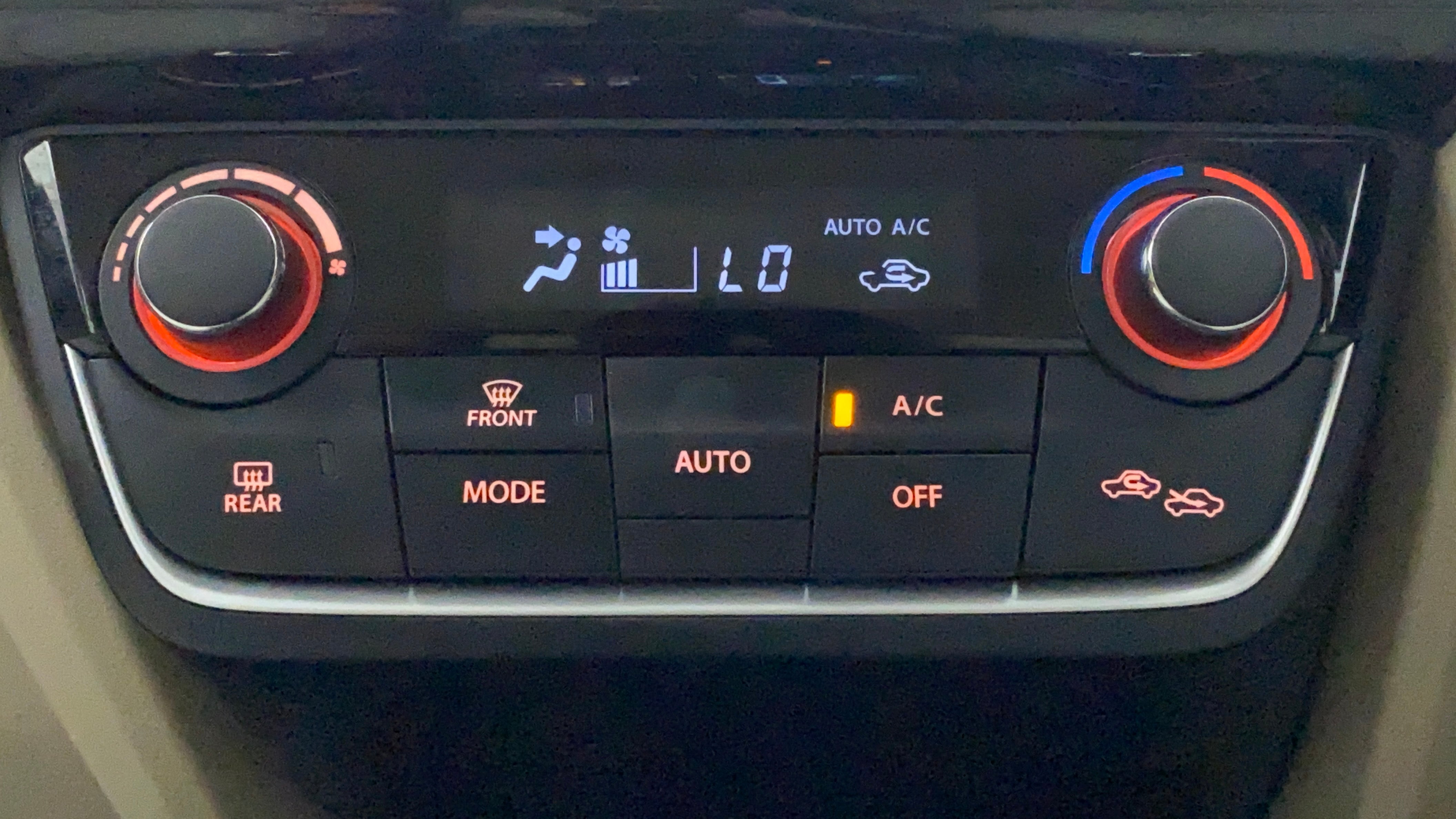 Dashboard air conditioning controls of a Maruti Suzuki Dzire 2018-2023