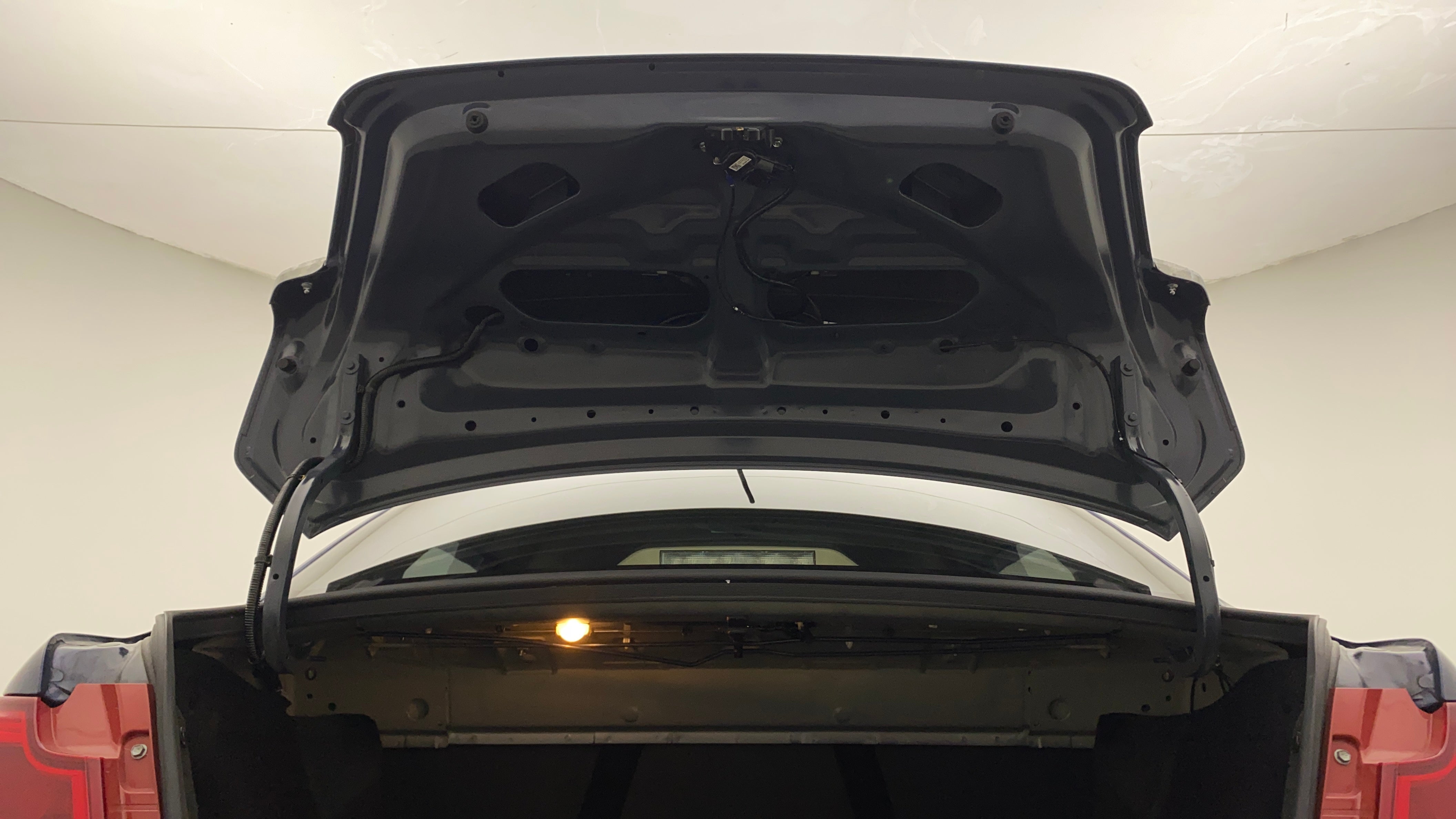 Open trunk view of a Maruti Suzuki Dzire 2018-2023