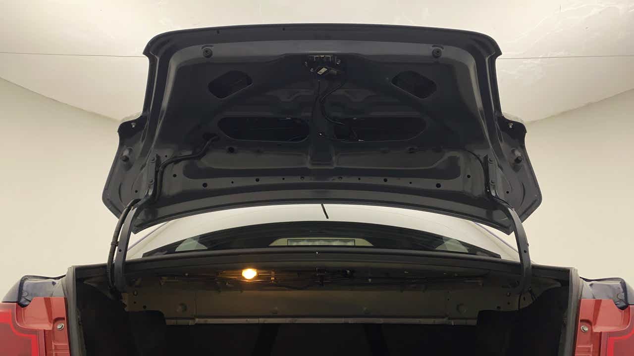 Open trunk view of a Maruti Suzuki Dzire 2018-2023