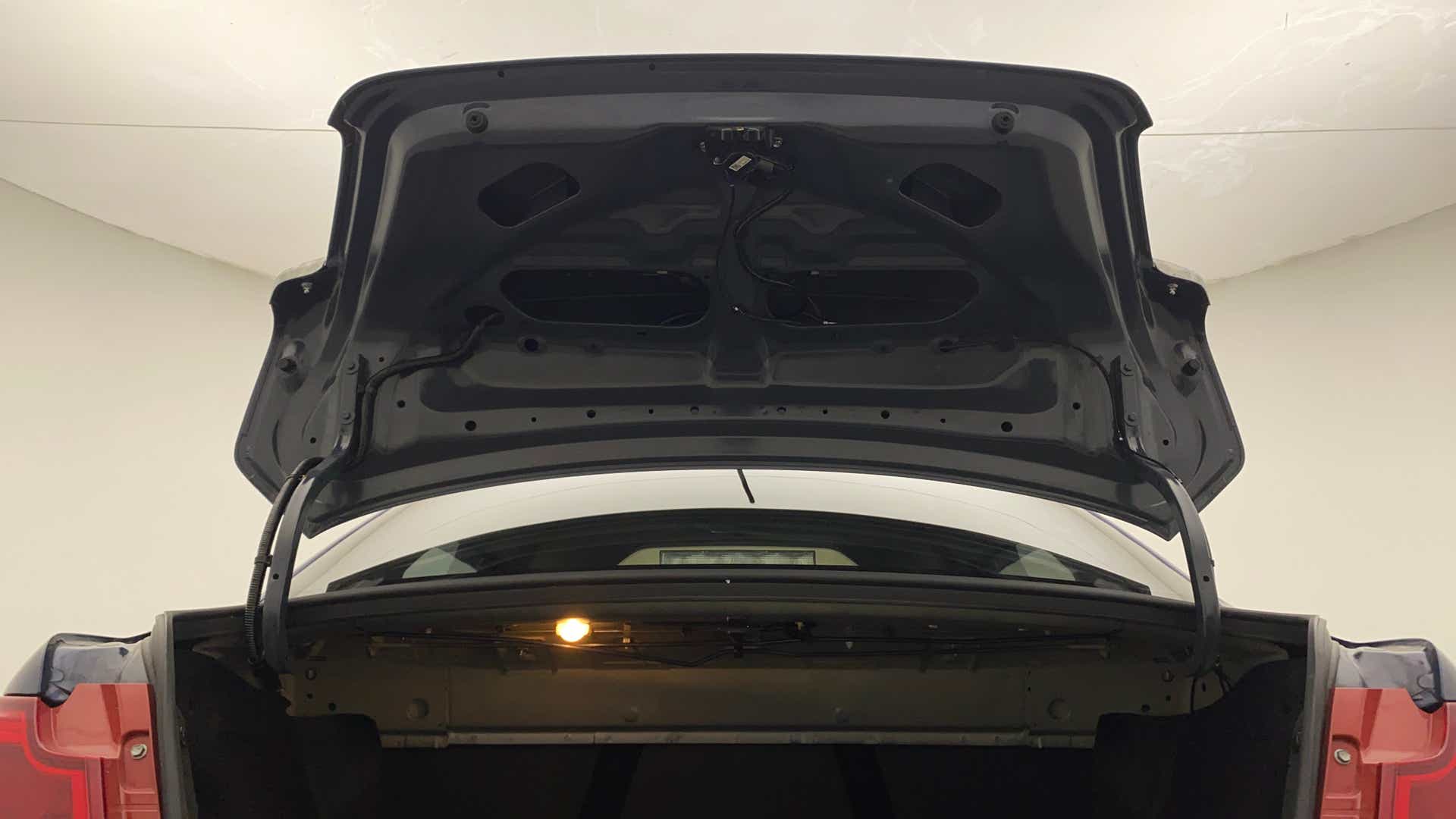 Open trunk view of a Maruti Suzuki Dzire 2018-2023