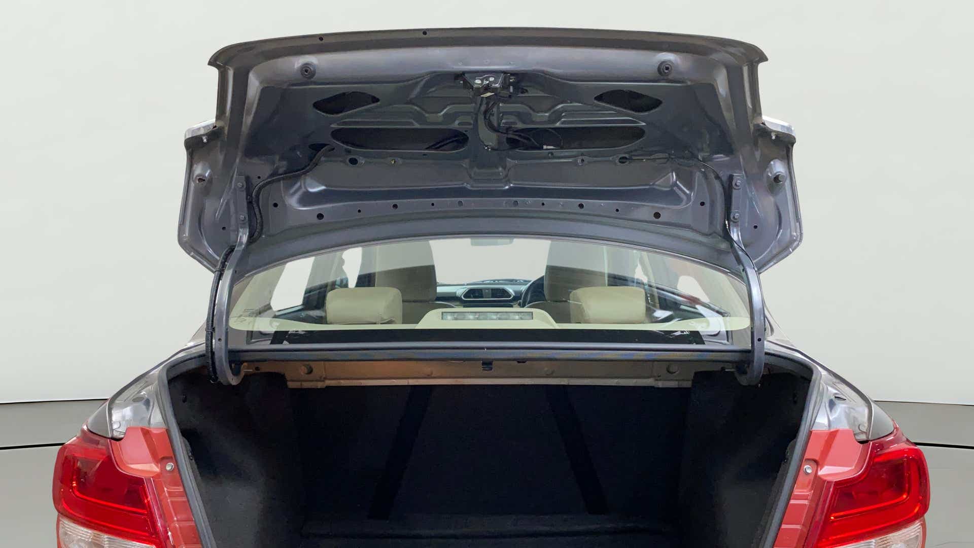 Open trunk view of a Maruti Suzuki Dzire 2018-2023