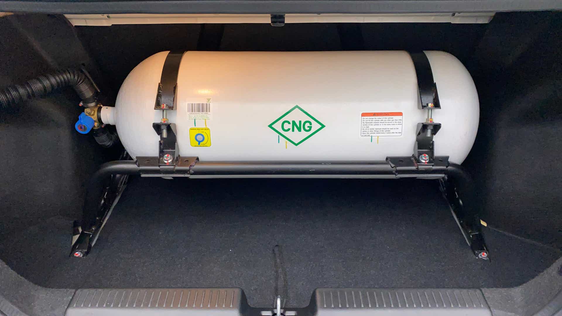 Cng cylinder in the boot of a Maruti Suzuki Dzire 2018-2023