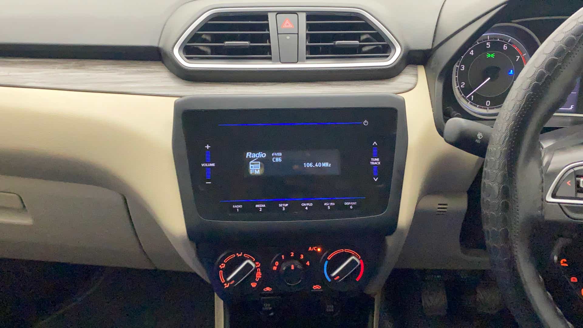 Interior dashboard of a Maruti Suzuki Dzire 2018-2023
