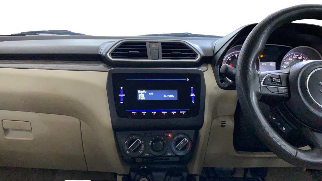 Interior dashboard of a Maruti Suzuki Dzire 2018-2023