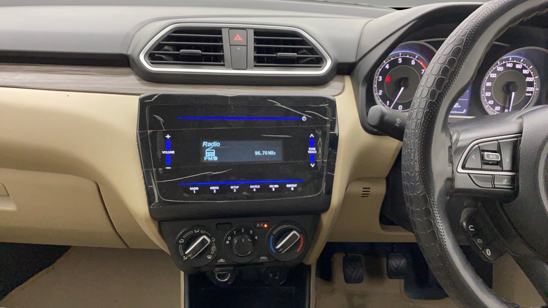 Dashboard and center console of a Maruti Suzuki Dzire