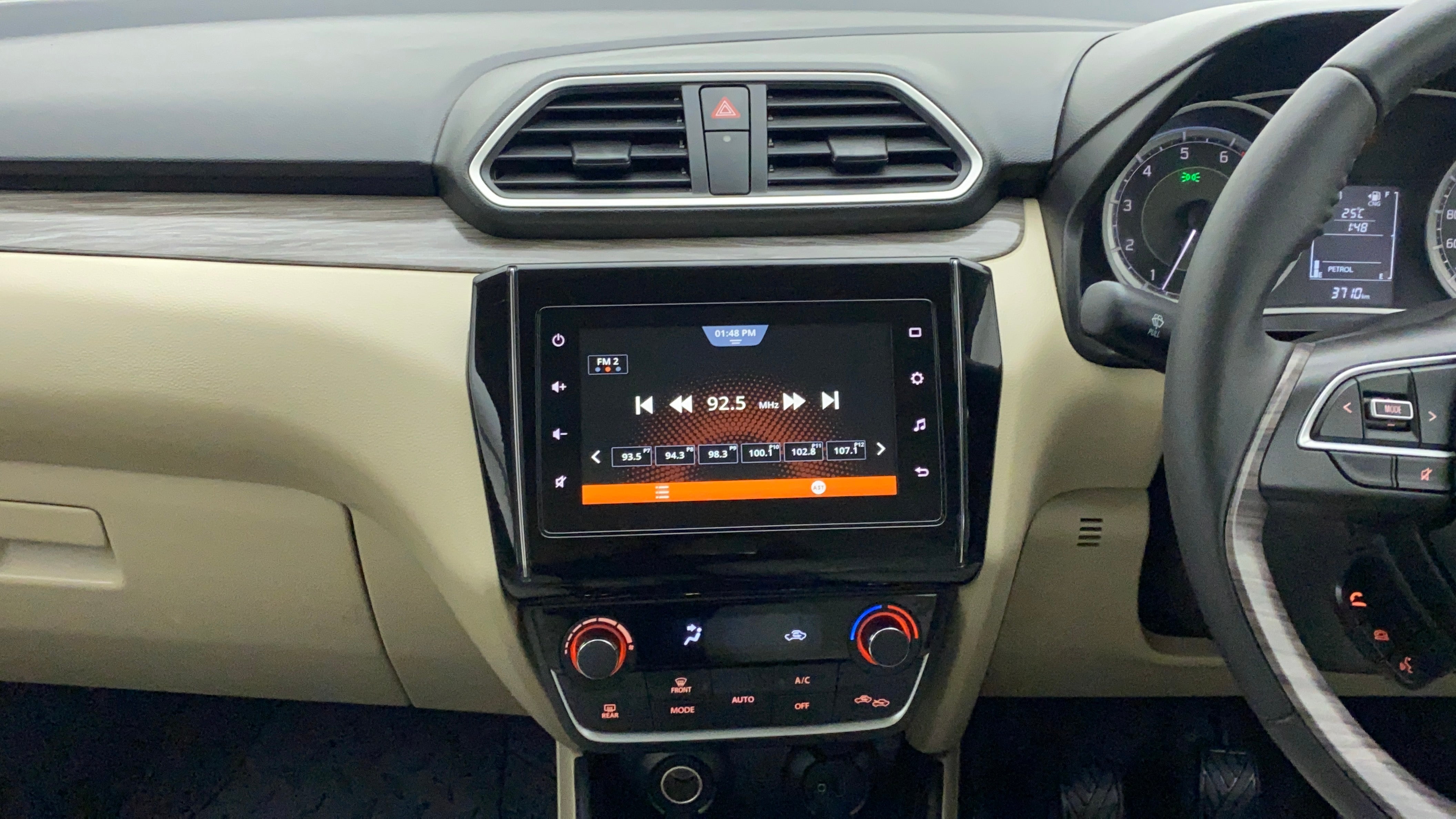 Dashboard and infotainment system of a Maruti Suzuki Dzire 2018-2023