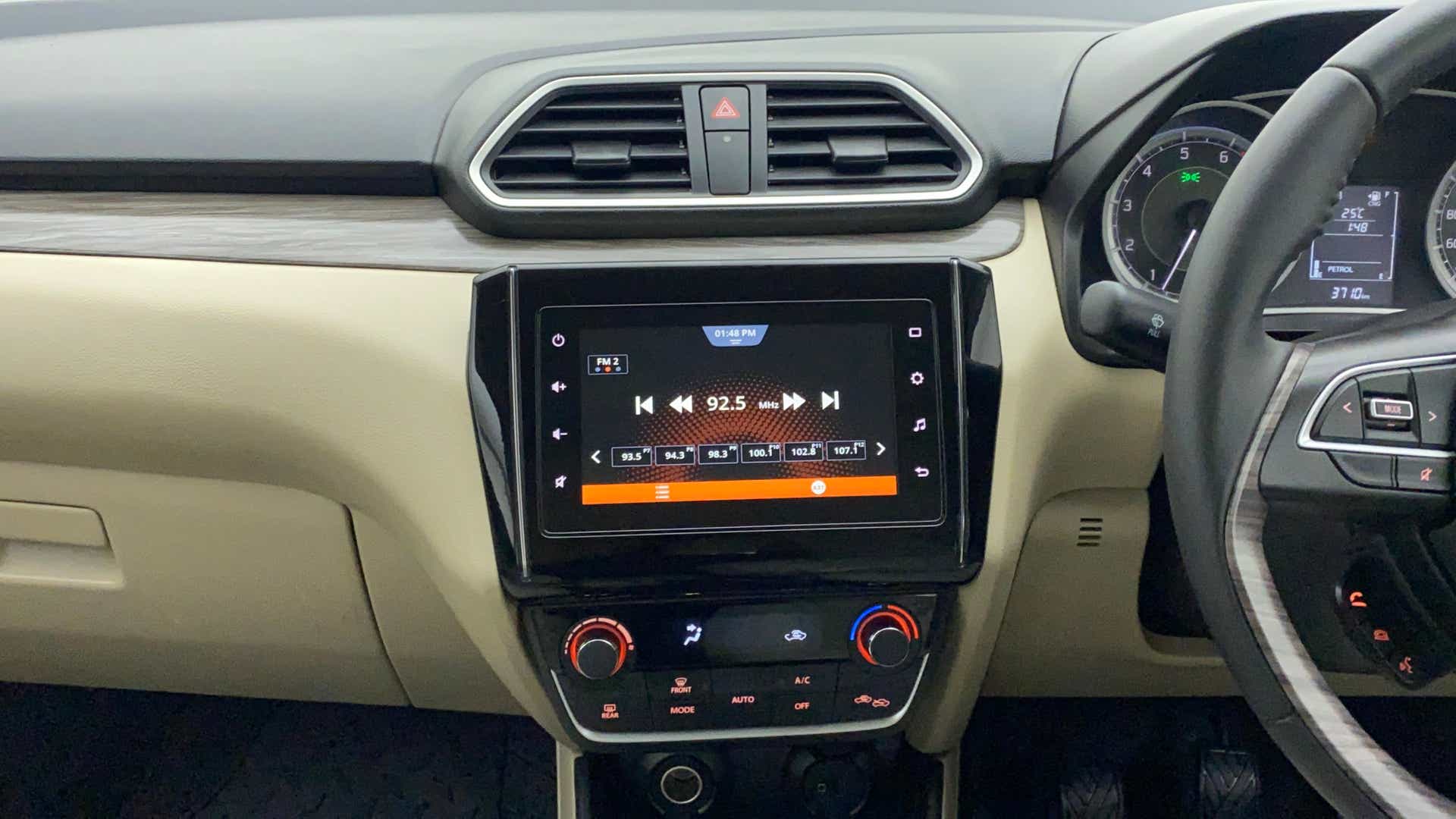 Dashboard and infotainment system of a Maruti Suzuki Dzire 2018-2023
