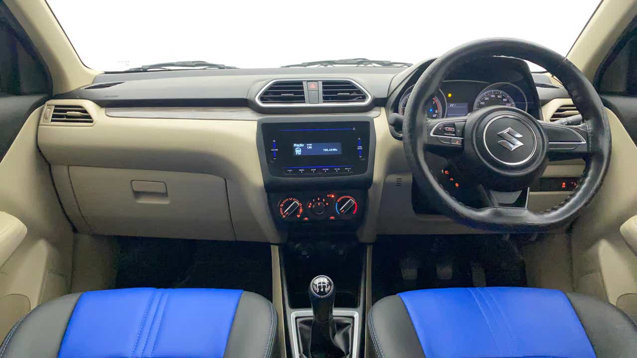 Dashboard and steering wheel of a Maruti Suzuki Dzire 2018-2023