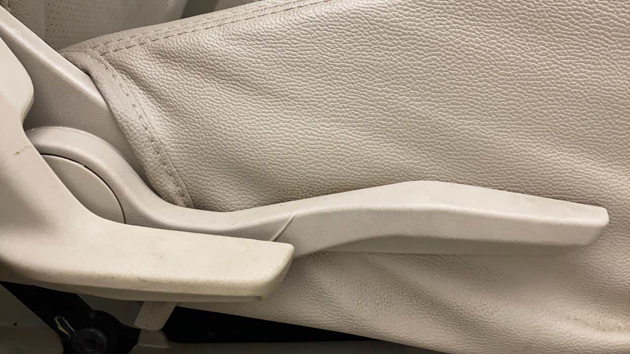 Close-up of seat adjustment lever in a Maruti Suzuki Dzire