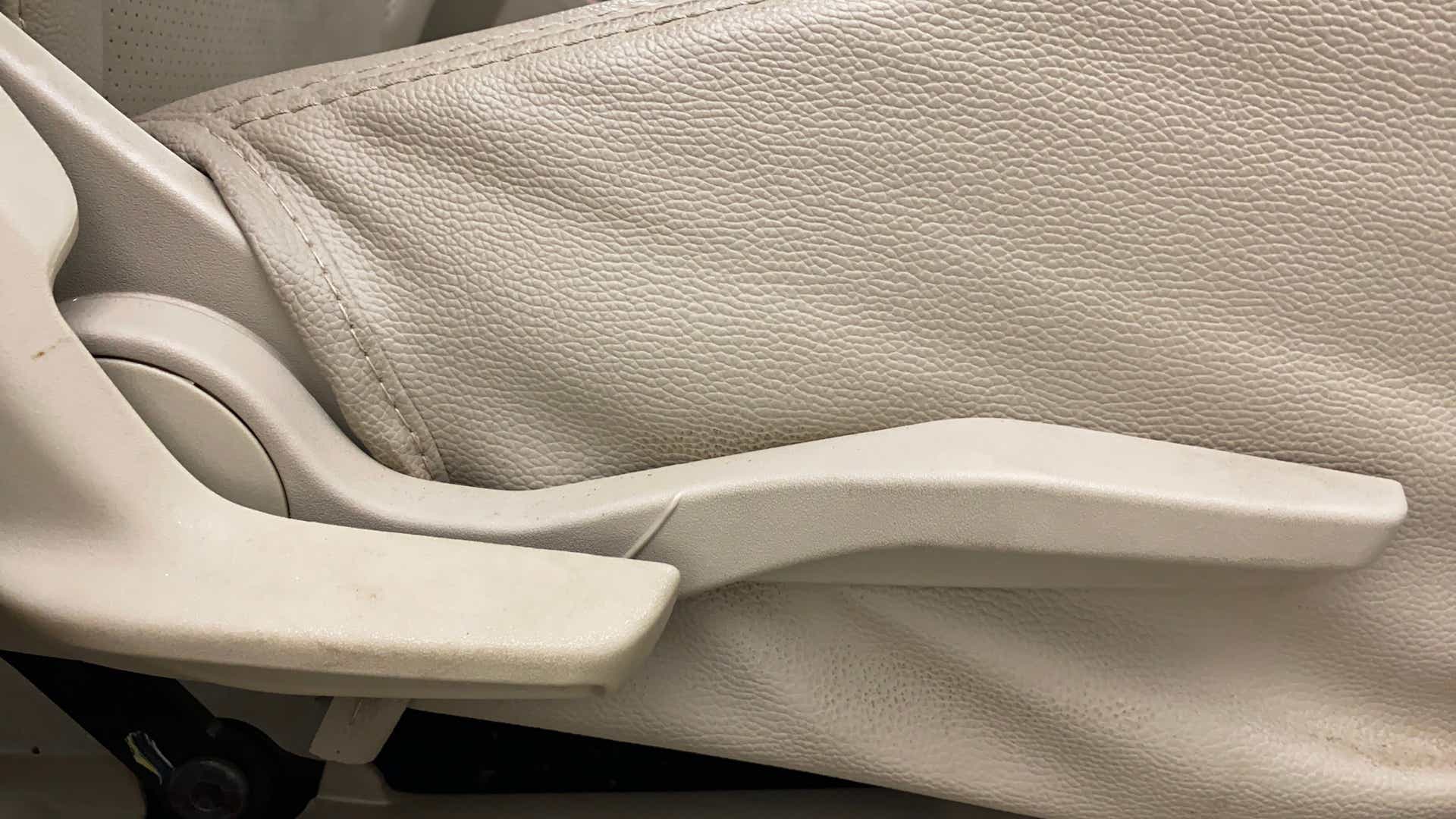 Close-up of seat adjustment lever in a Maruti Suzuki Dzire