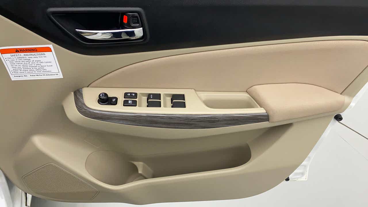 Driver door controls of a Maruti Suzuki Dzire 2018-2023