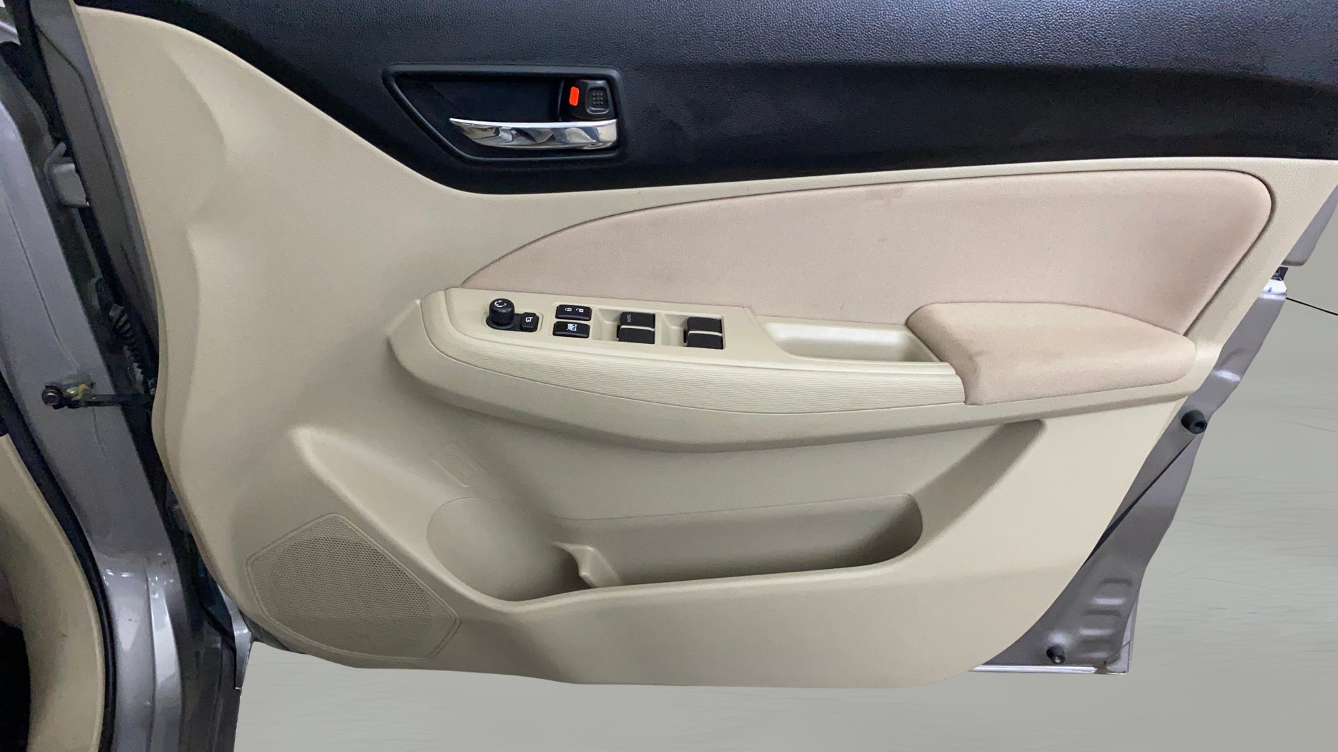 Interior door panel of a Maruti Suzuki Dzire 2018-2023