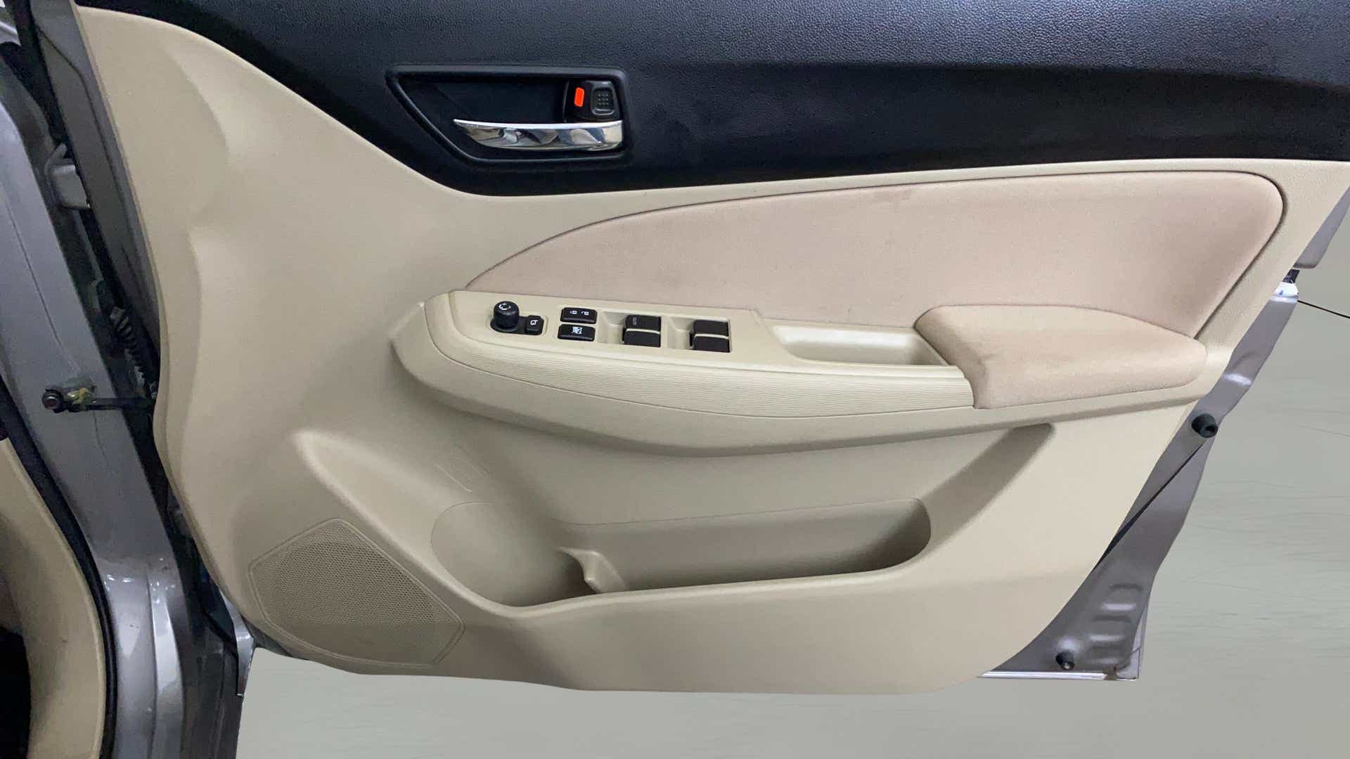 Interior door panel of a Maruti Suzuki Dzire 2018-2023
