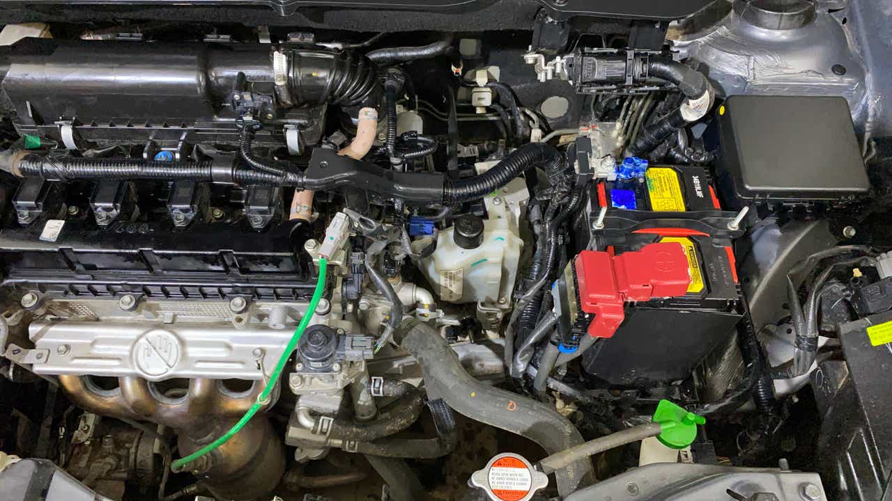 Engine compartment of a Maruti Suzuki Dzire 2018-2023