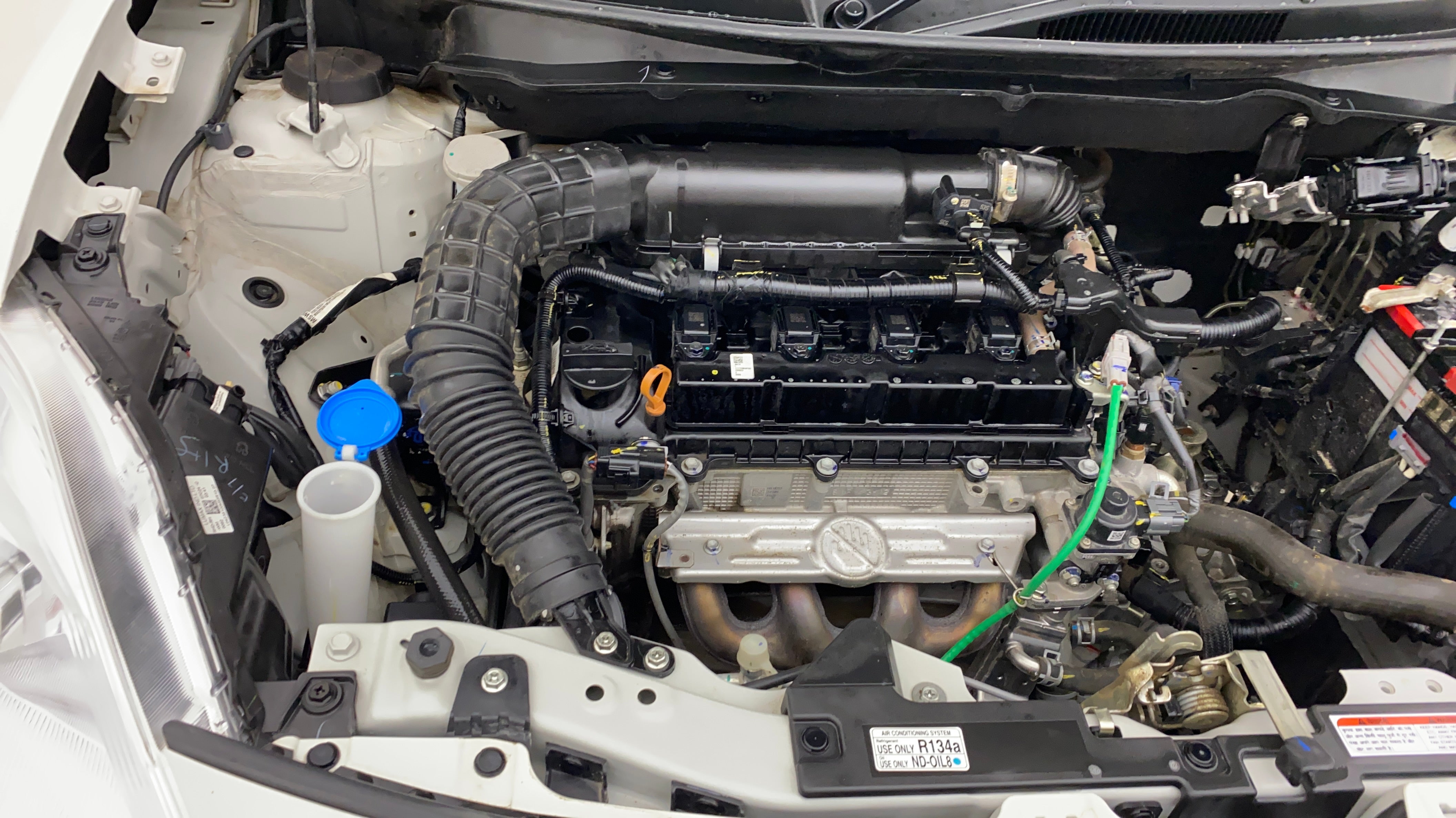Engine bay view of a Maruti Suzuki Dzire