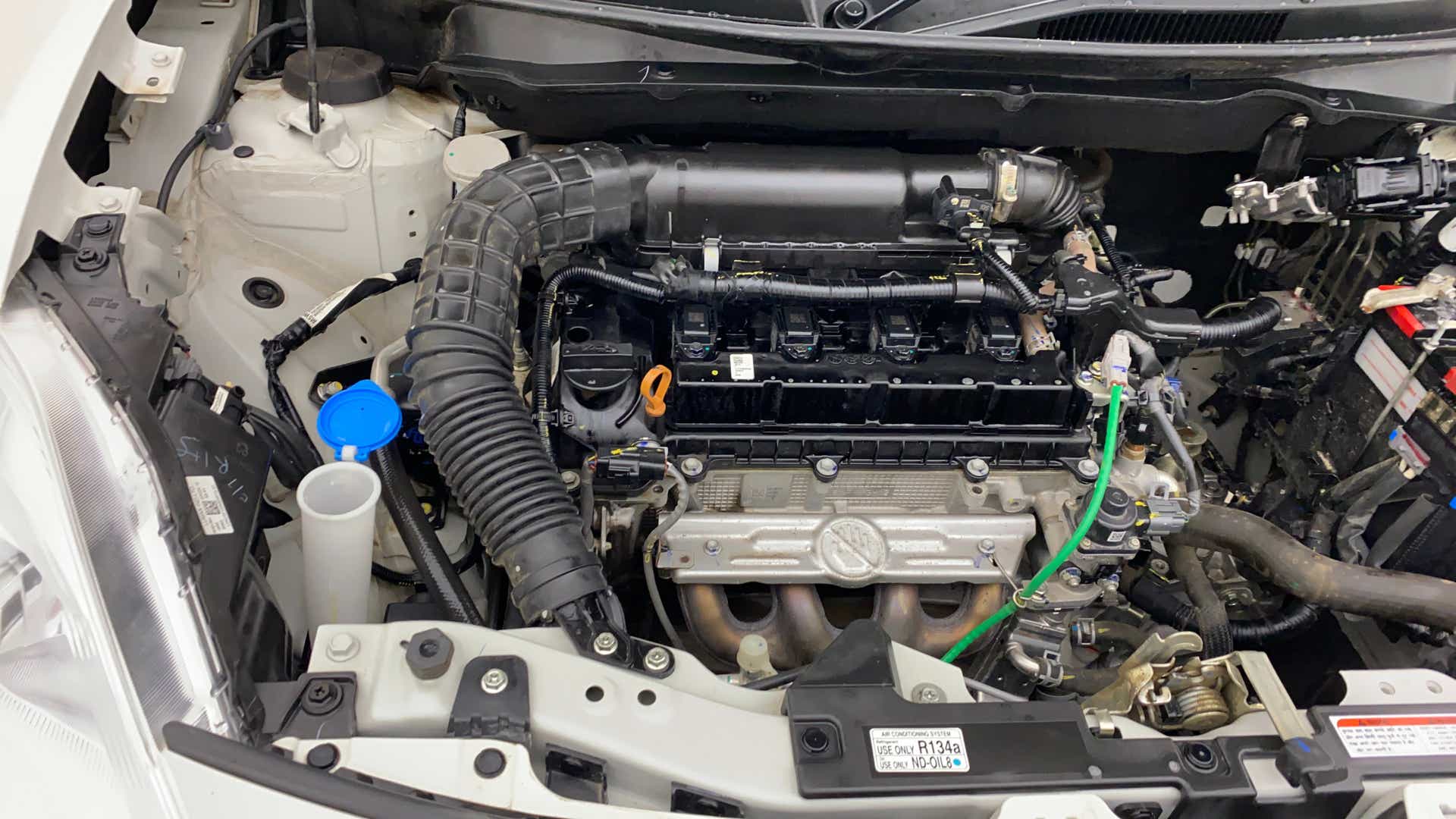 Engine bay view of a Maruti Suzuki Dzire