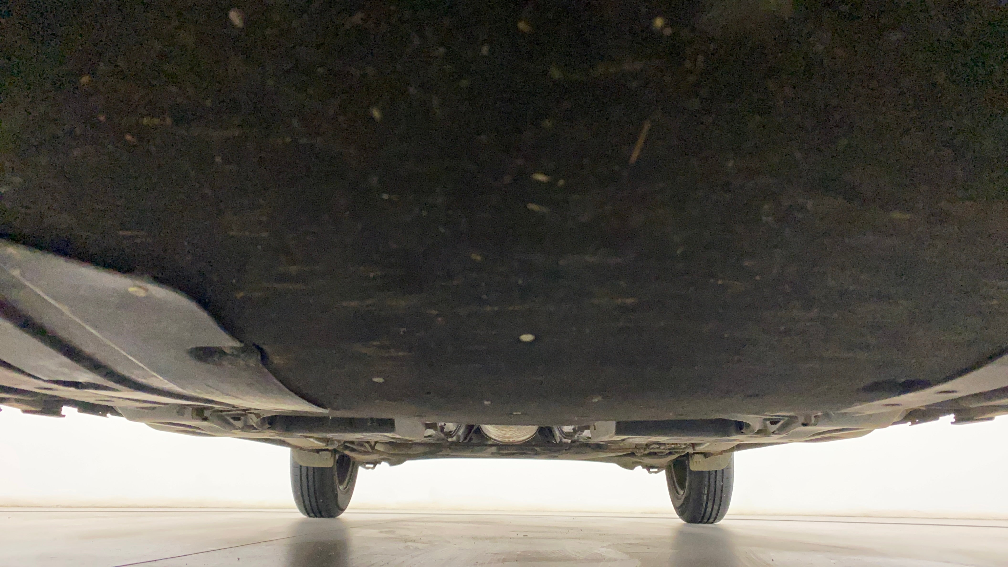 Undercarriage view of a Maruti Suzuki Dzire 2018-2023