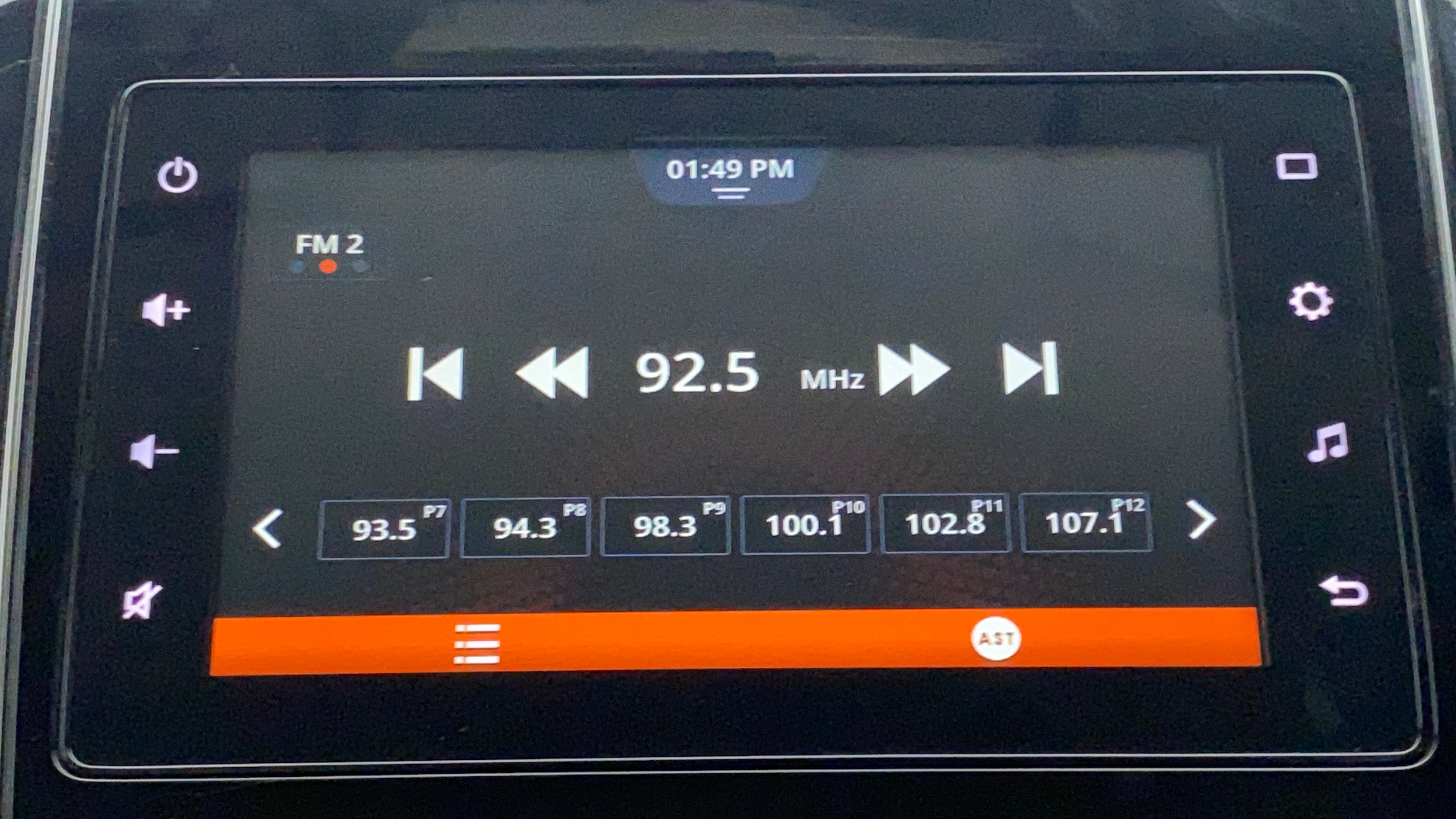 Car stereo display showing radio tuning screen of a Maruti Suzuki Dzire 2018-2023