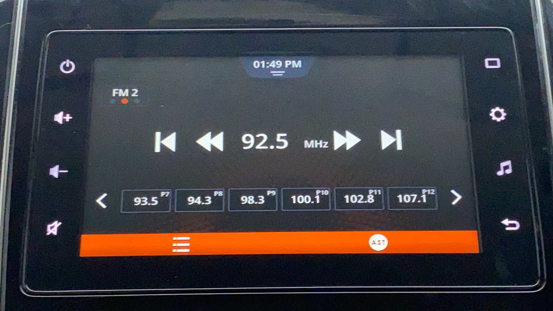 Car stereo display showing radio tuning screen of a Maruti Suzuki Dzire 2018-2023