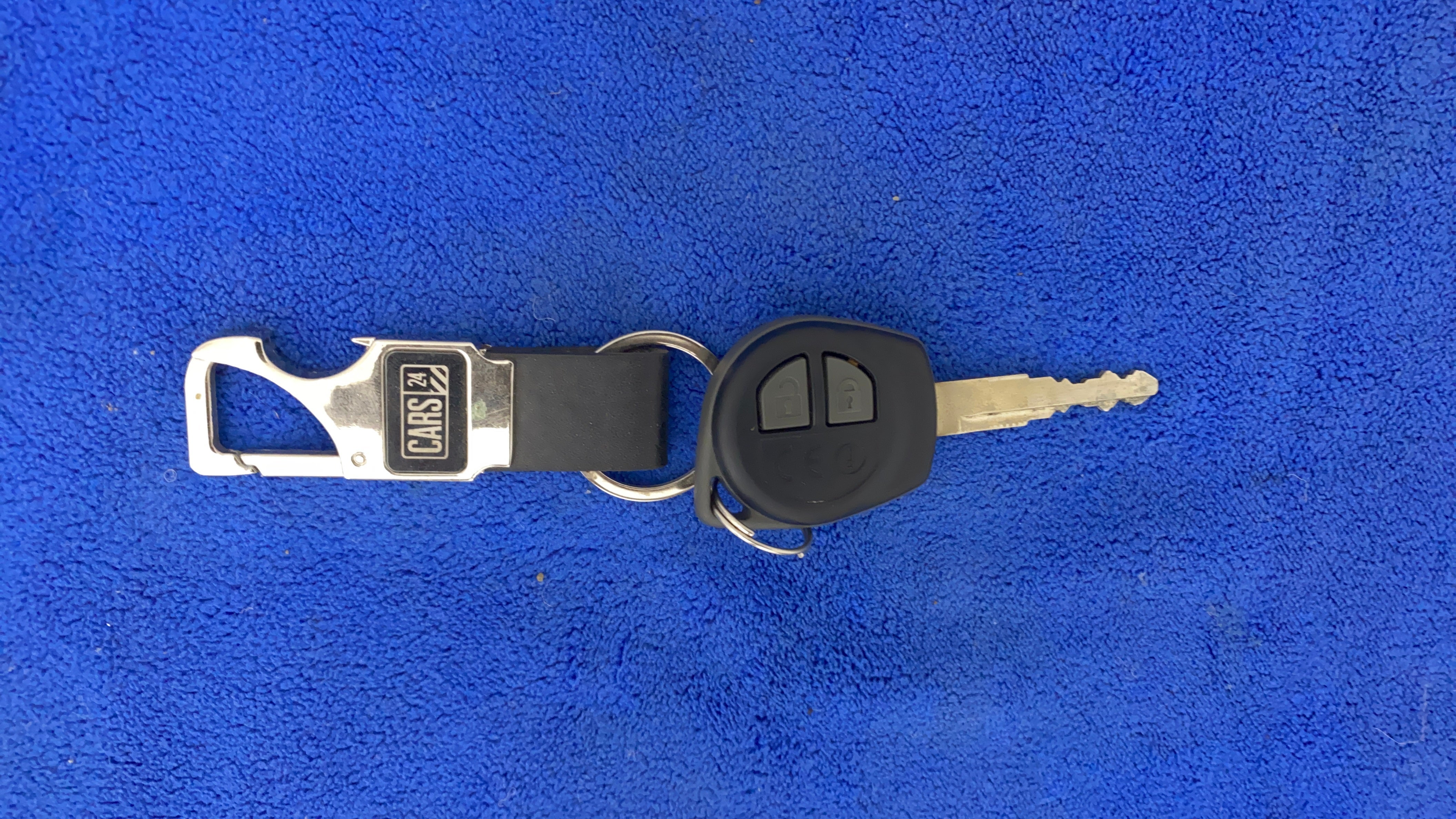Car key with remote of a Maruti Suzuki Dzire 2018-2023
