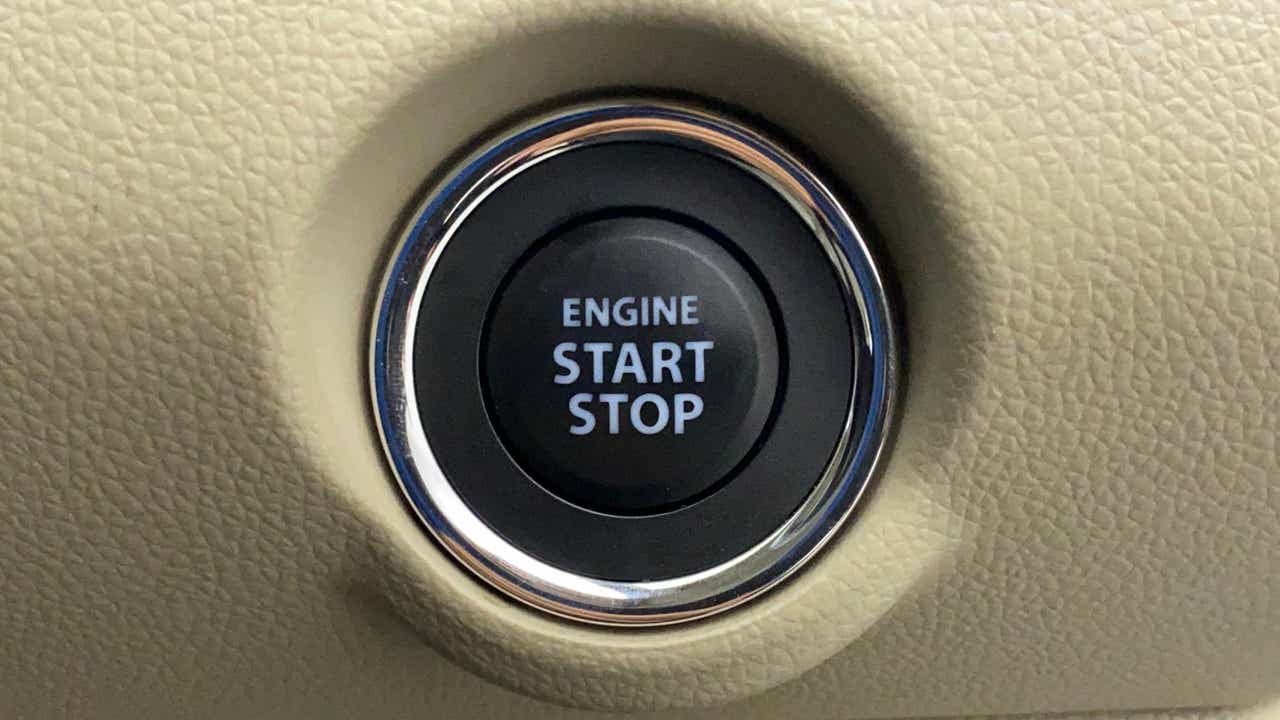 Engine start stop button of a Maruti Suzuki Dzire 2018-2023
