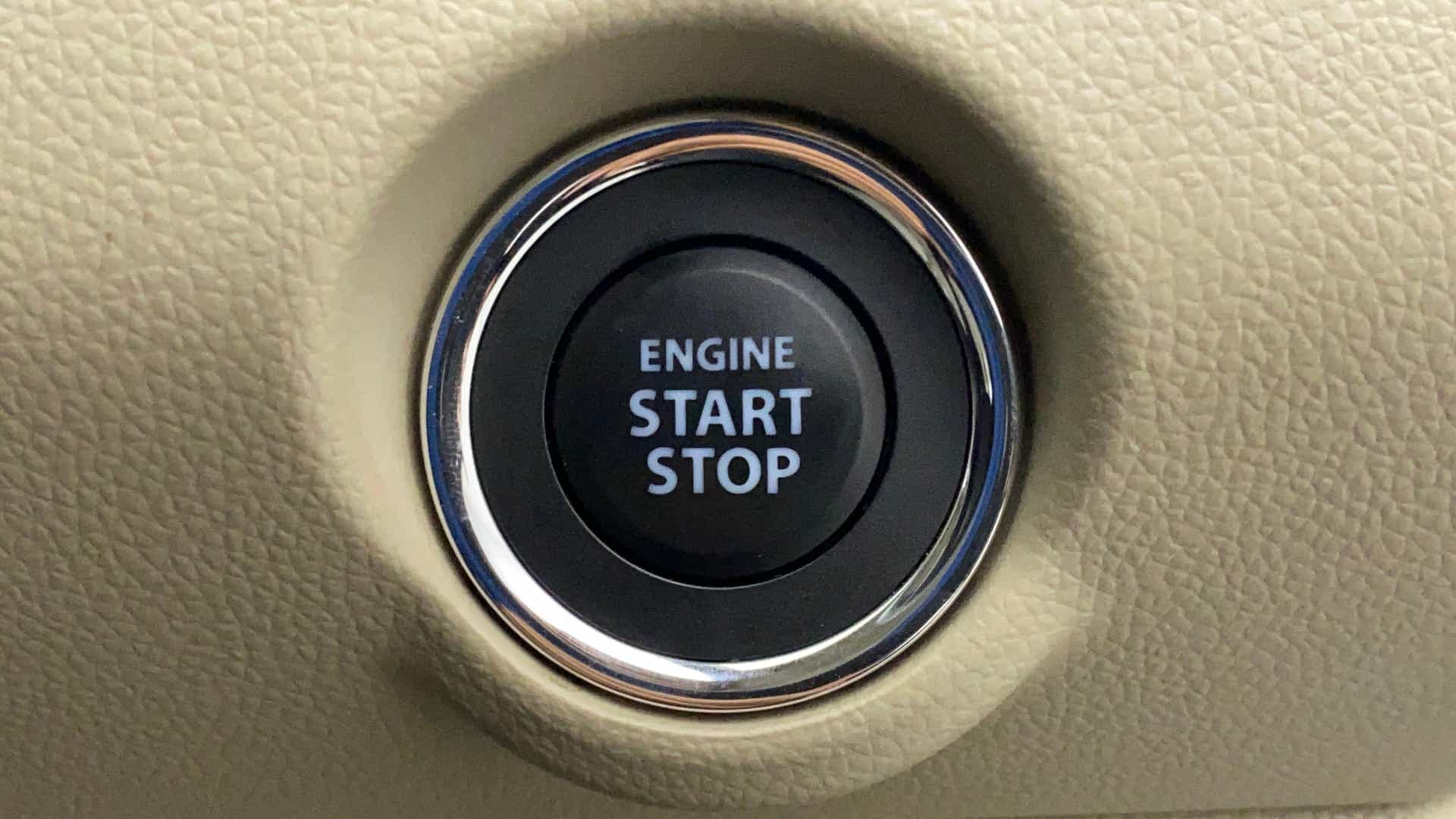 Engine start stop button of a Maruti Suzuki Dzire 2018-2023