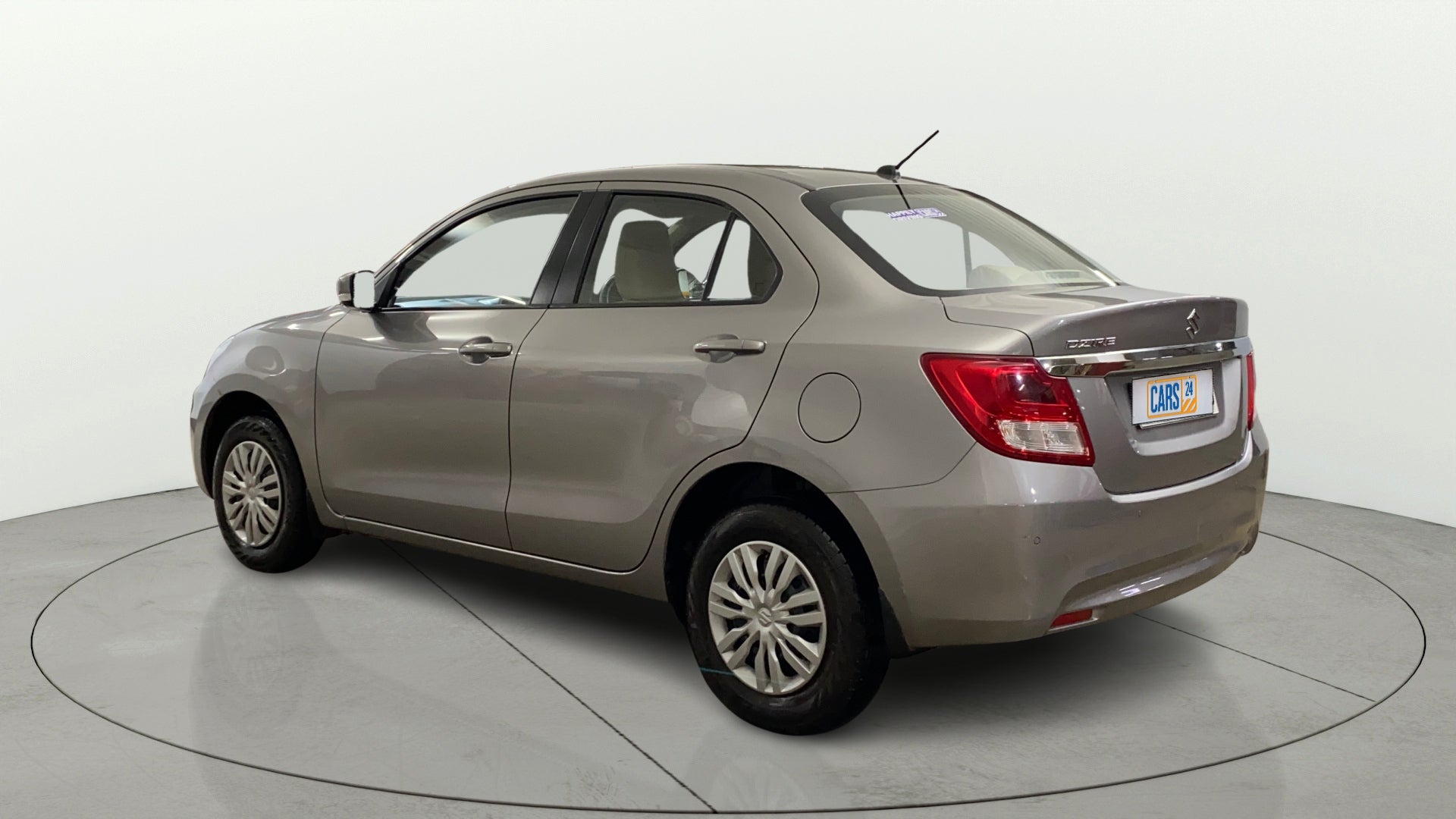 Rear three-quarter view of a Maruti Suzuki Dzire 2018-2023