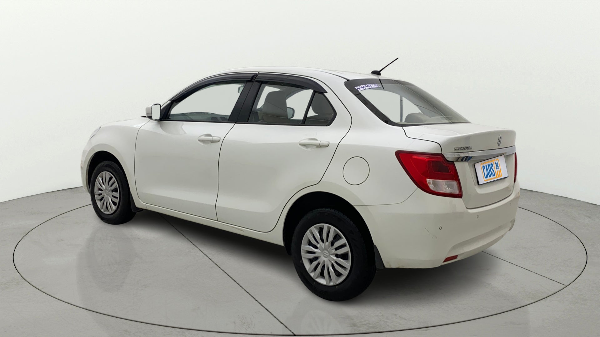Rear three-quarter view of a Maruti Suzuki Dzire