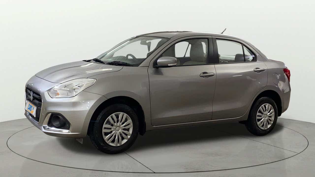Side view of a Splendid Silver Maruti Suzuki Dzire 2018-2023