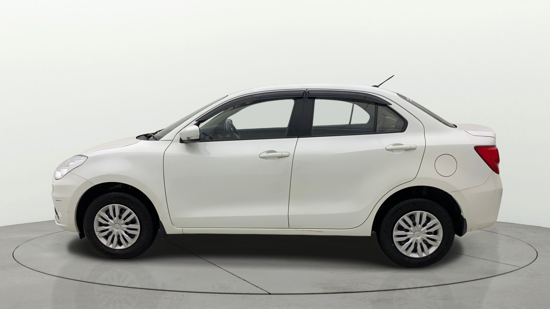 Side view of a Maruti Suzuki Dzire
