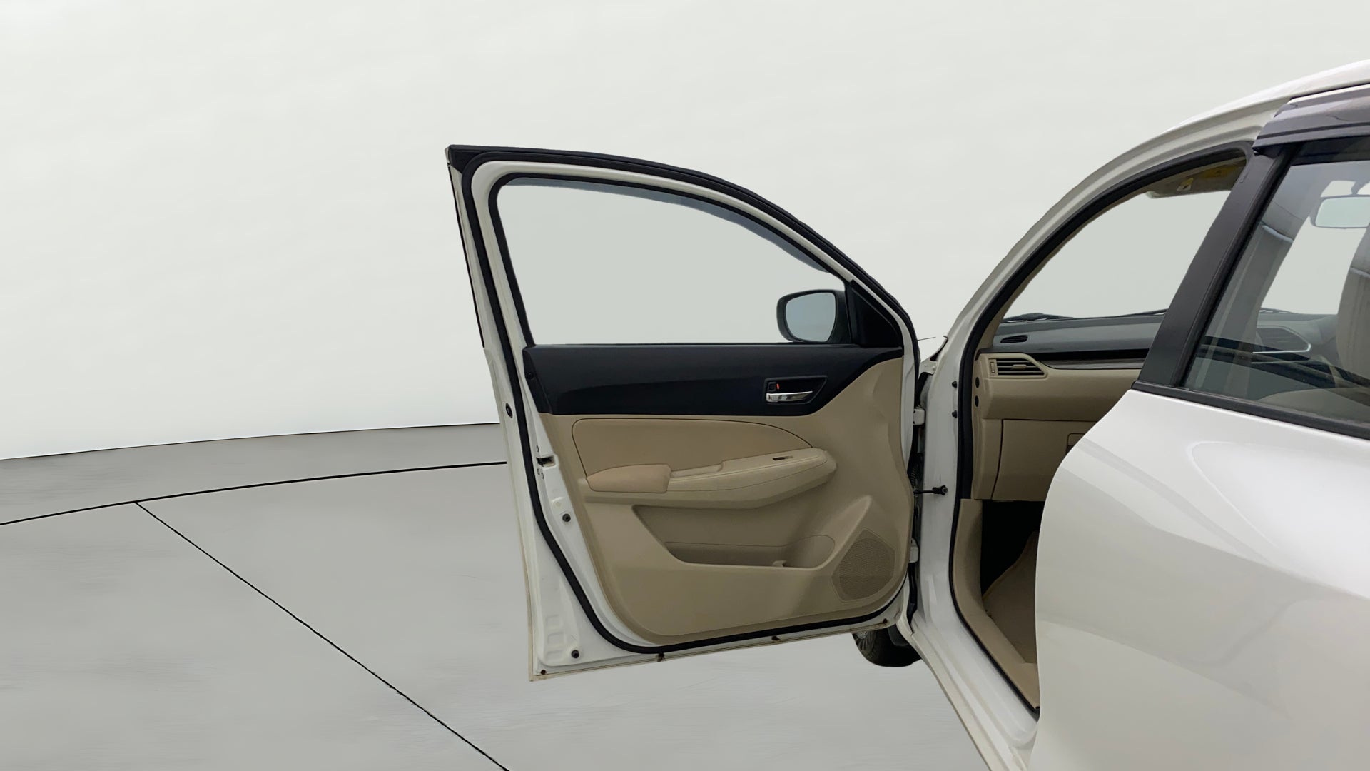 Front door interior of a Maruti Suzuki Dzire