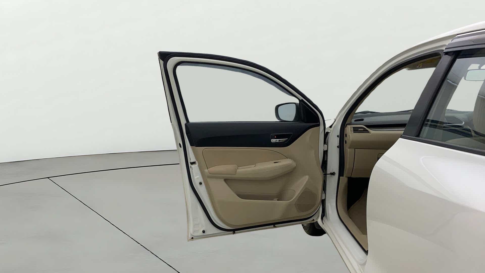 Front door interior of a Maruti Suzuki Dzire