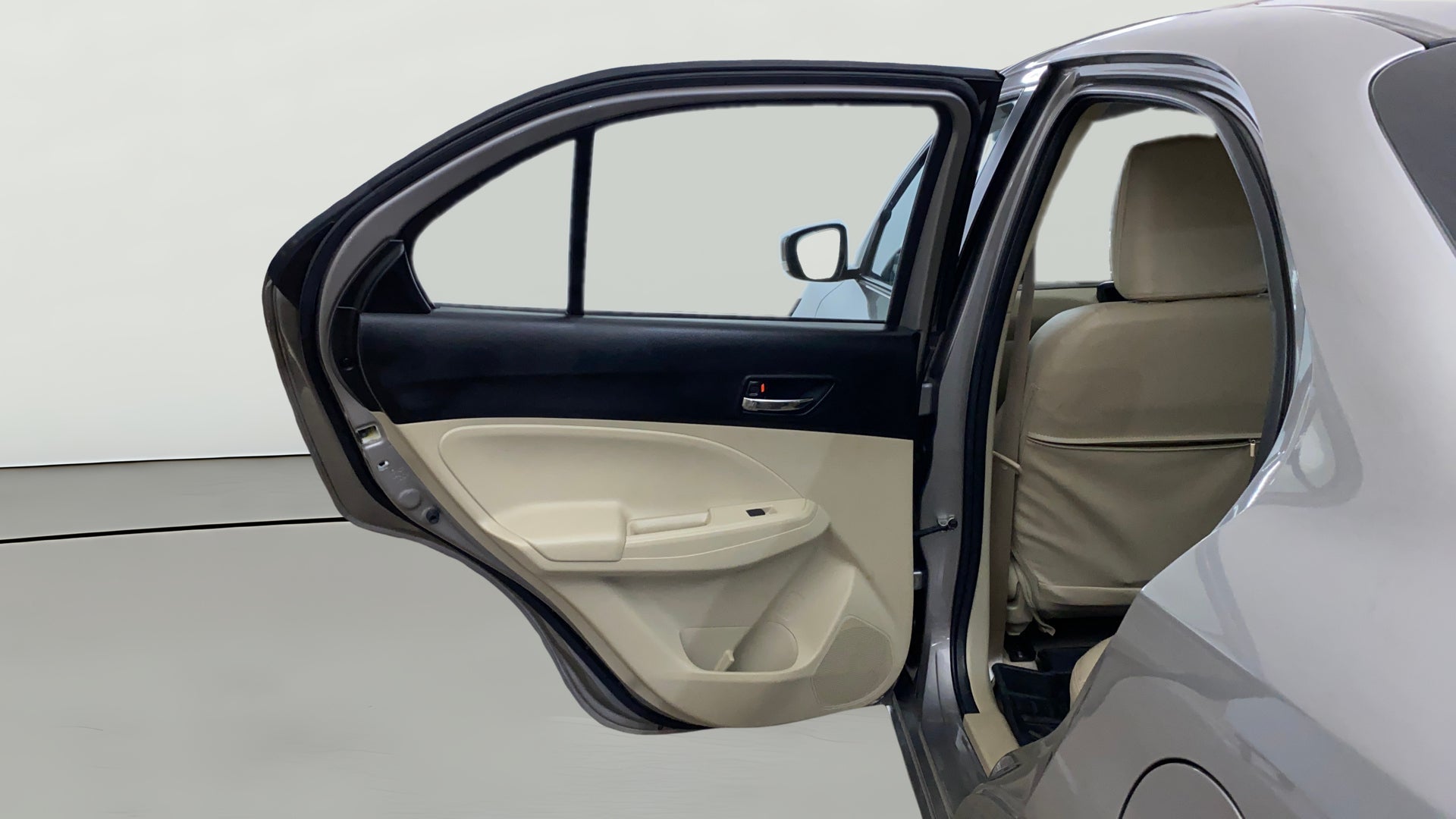 Rear left door and interior view of a Maruti Suzuki Dzire 2018-2023