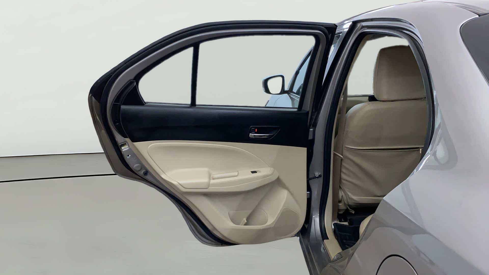 Rear left door and interior view of a Maruti Suzuki Dzire 2018-2023