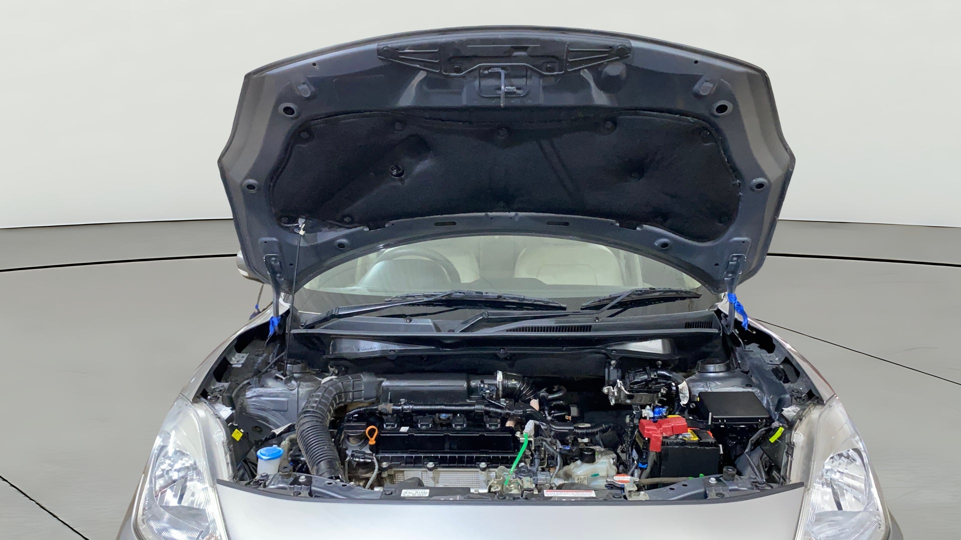 Engine bay of a Maruti Suzuki Dzire 2018-2023