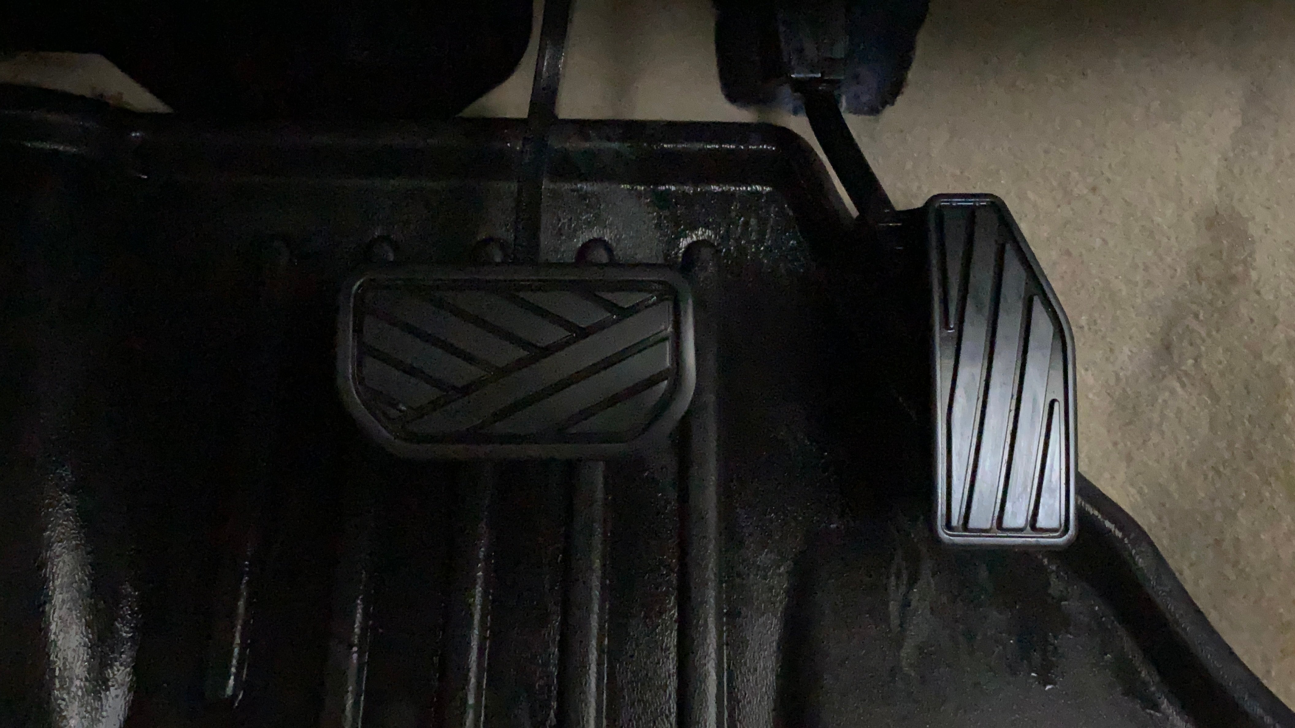 Close-up of pedals of a Maruti Suzuki Dzire 2018-2023