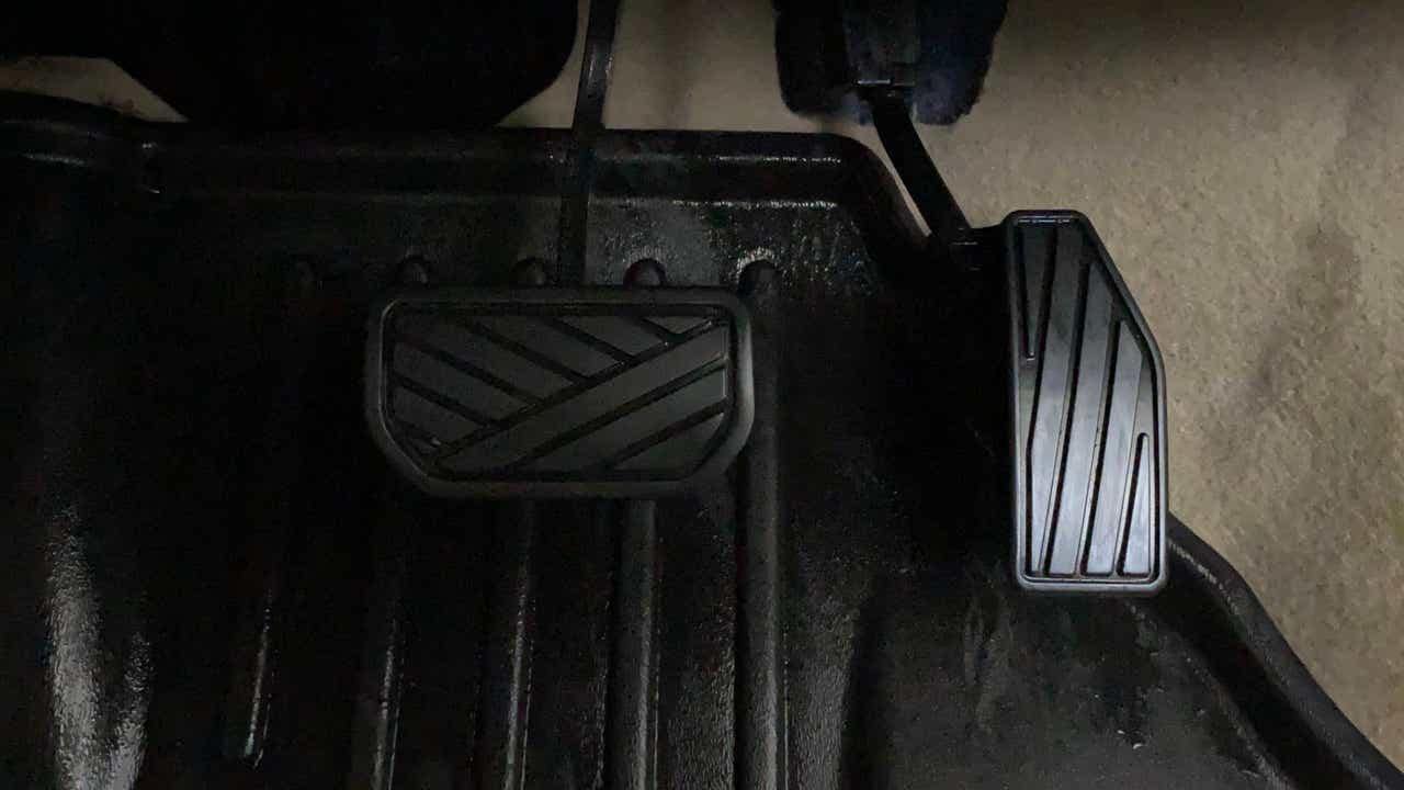 Close-up of pedals of a Maruti Suzuki Dzire 2018-2023