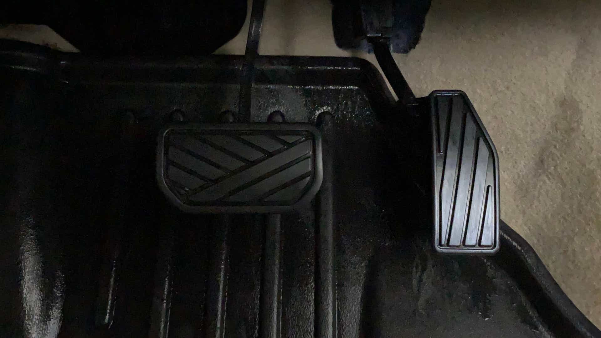 Close-up of pedals of a Maruti Suzuki Dzire 2018-2023