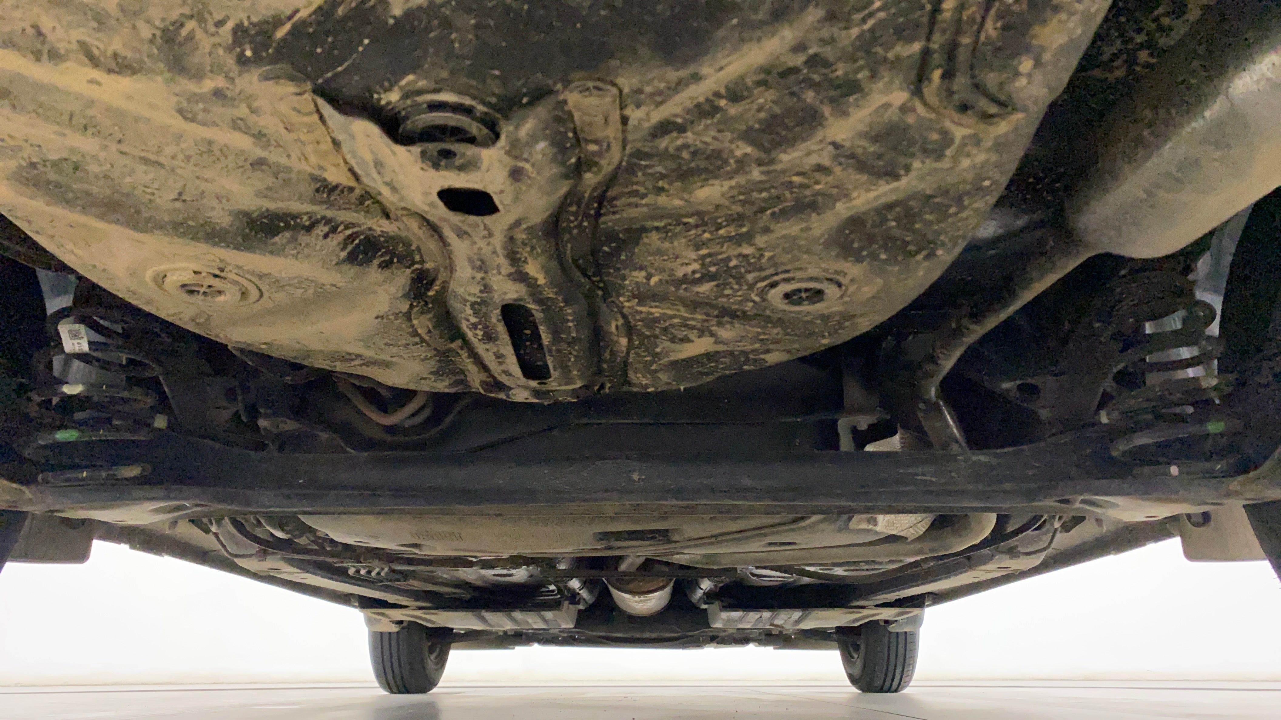 Undercarriage view of a Maruti Suzuki Dzire 2018-2023