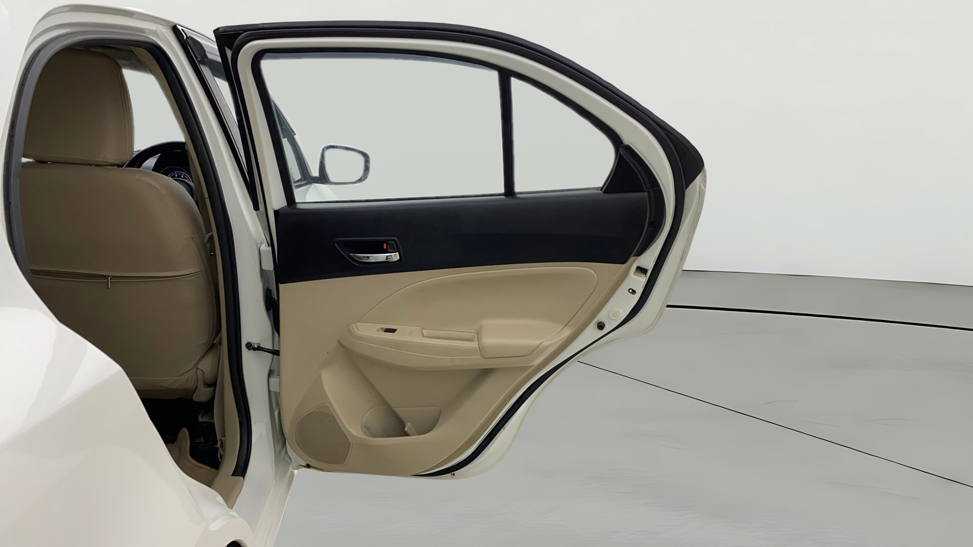 Rear door interior view of a Maruti Suzuki Dzire
