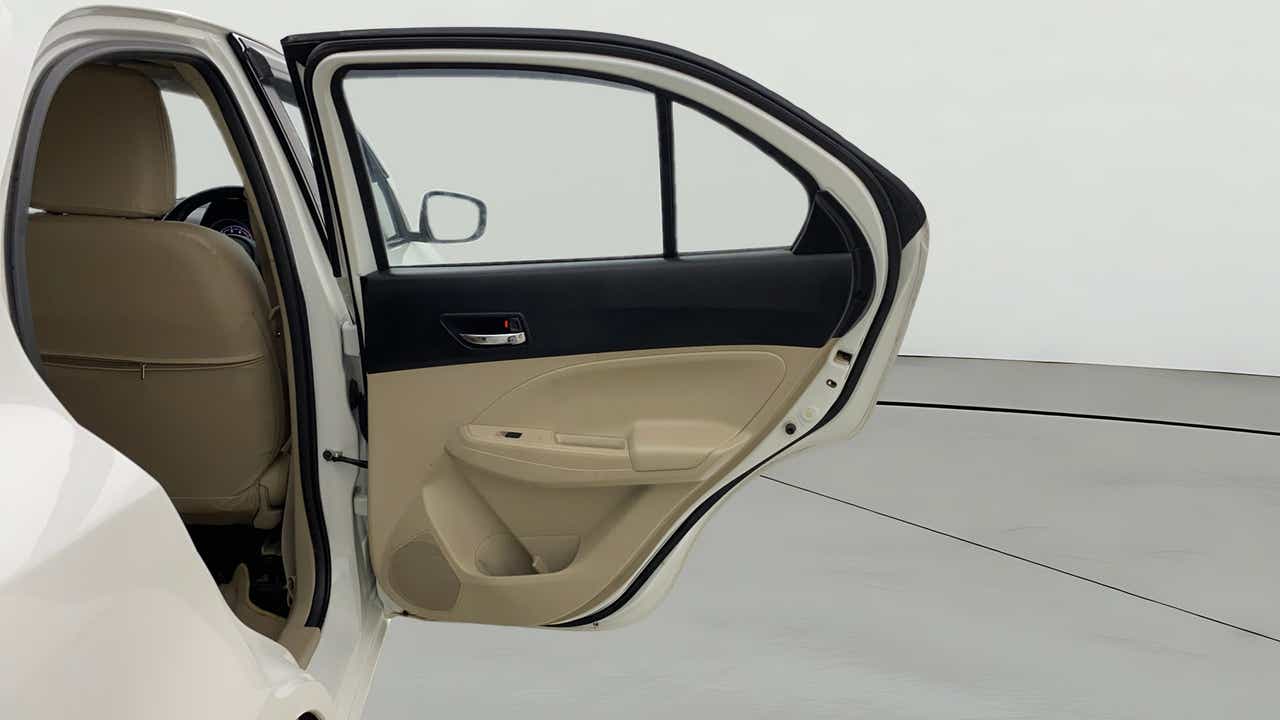Rear door interior view of a Maruti Suzuki Dzire