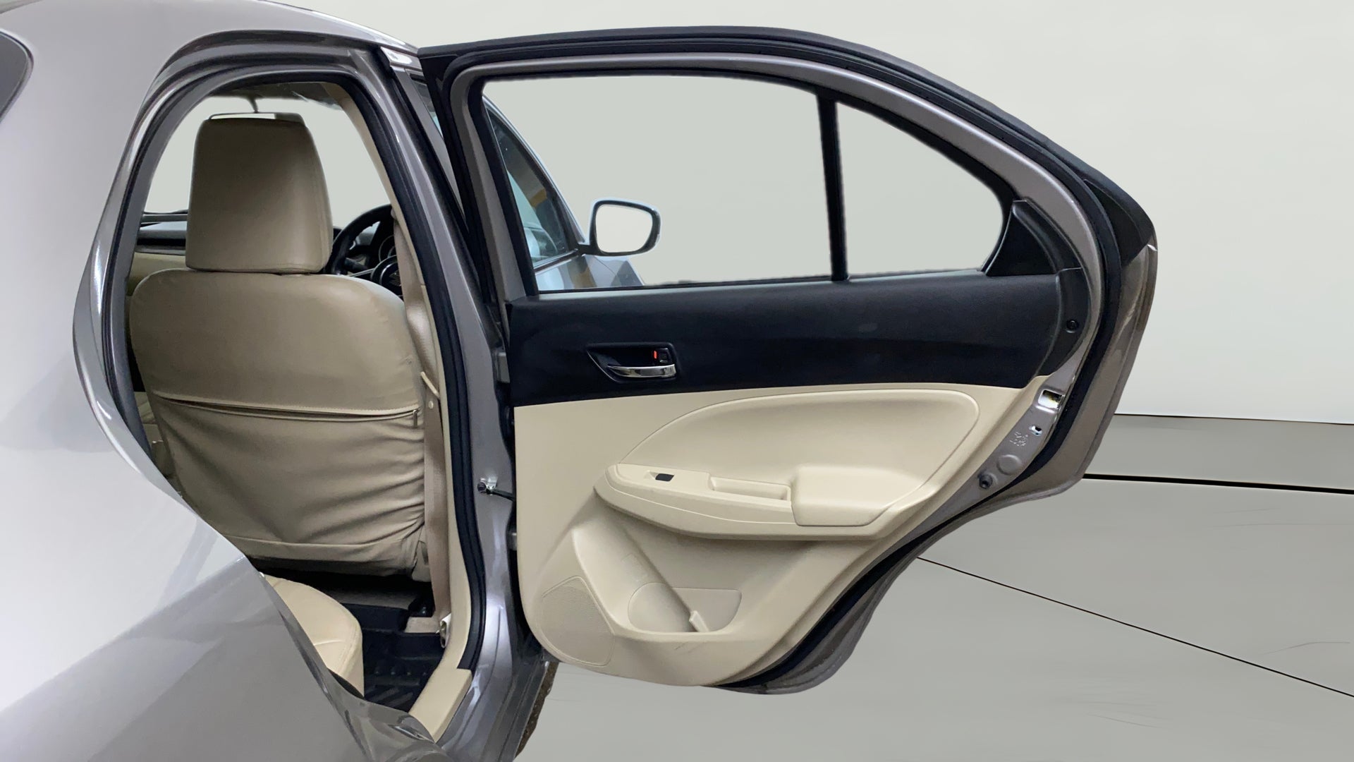 Rear left door and interior view of a Maruti Suzuki Dzire 2018-2023