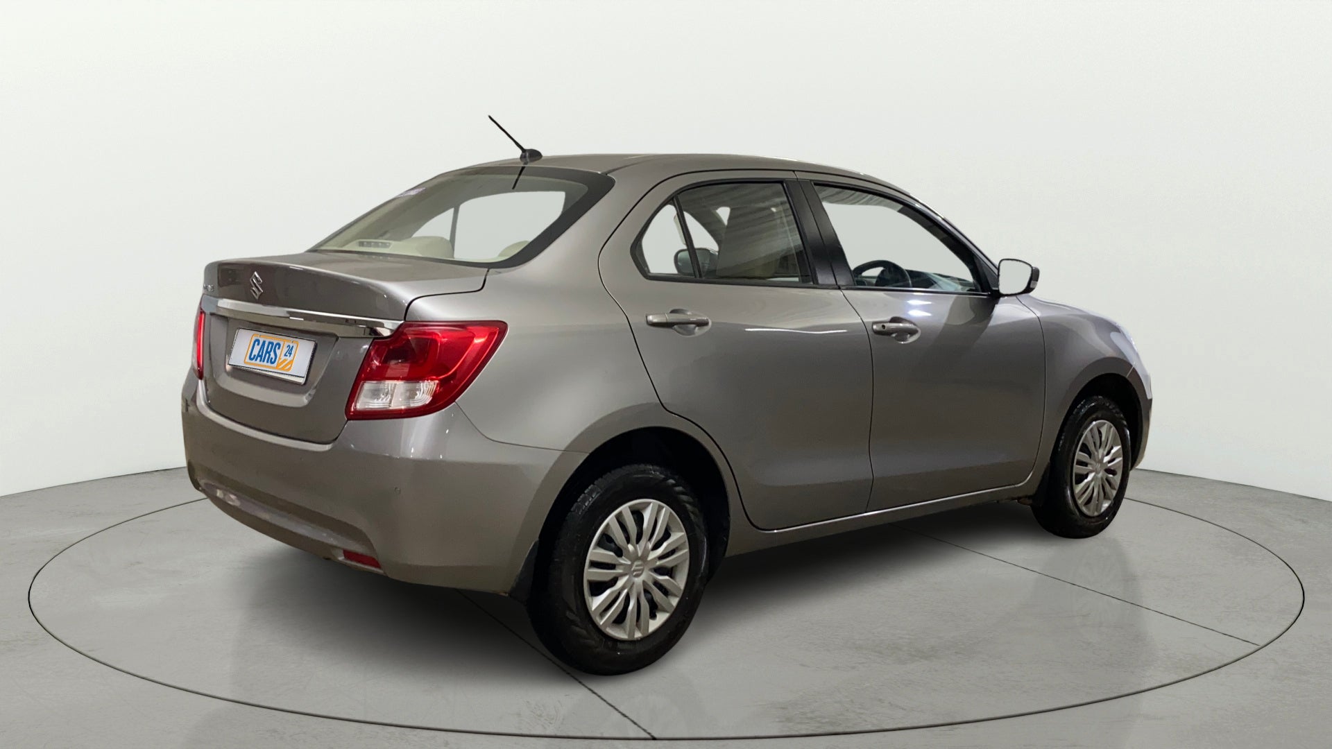Rear three-quarter view of a Maruti Suzuki Dzire 2018-2023