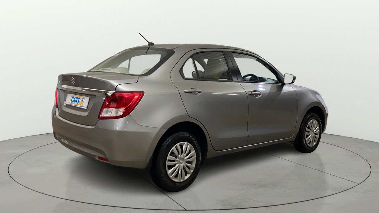 Rear three-quarter view of a Maruti Suzuki Dzire 2018-2023
