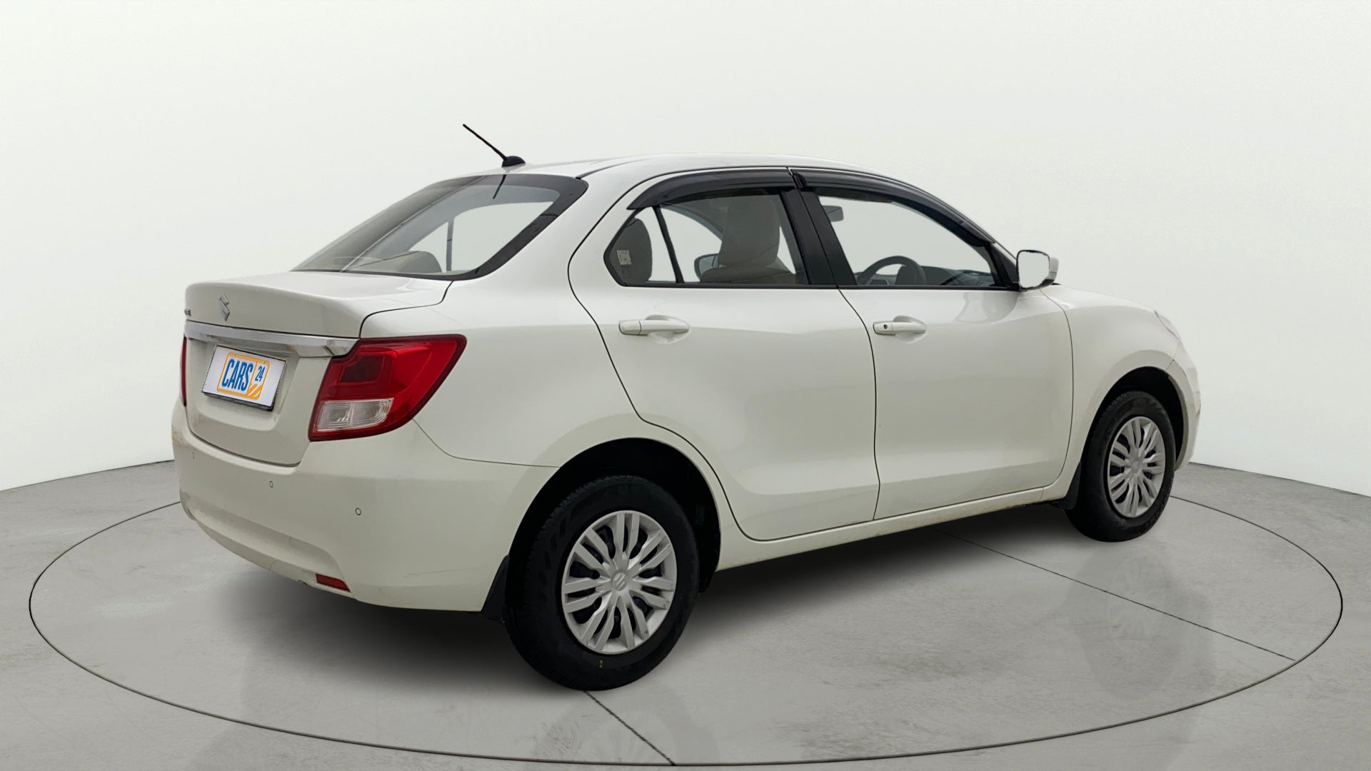 Rear three-quarter view of a Maruti Suzuki Dzire