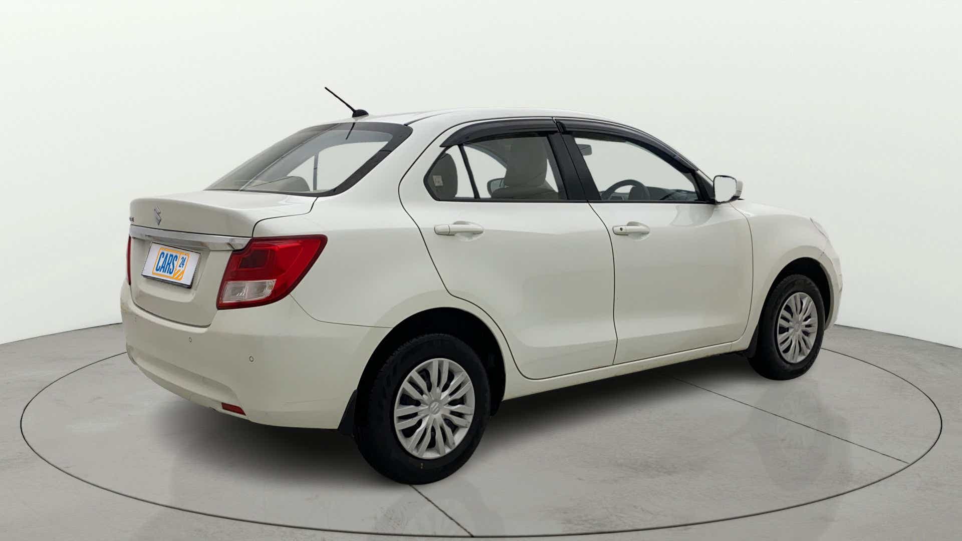Rear three-quarter view of a Maruti Suzuki Dzire