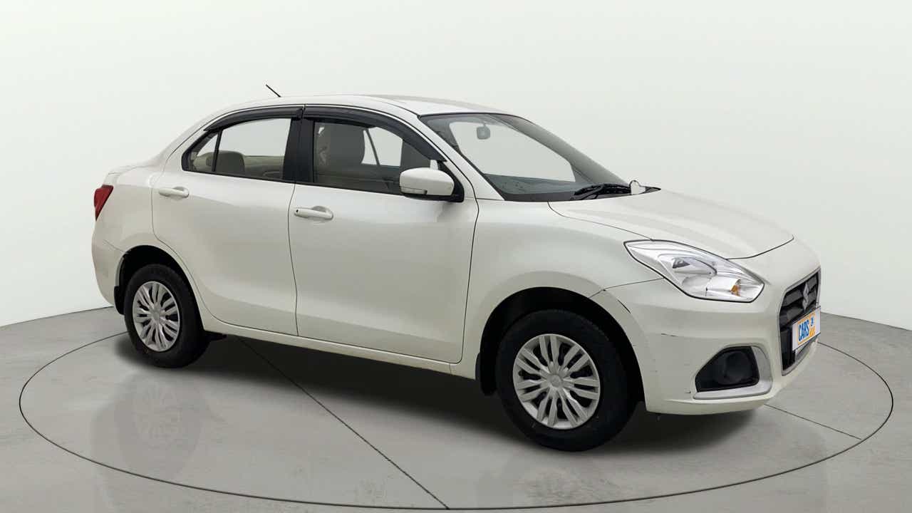 Front three-quarter view of a Pearl Arctic White Maruti Suzuki Dzire